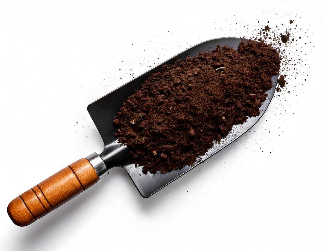 Top view of Soil with garden tool on white background photo