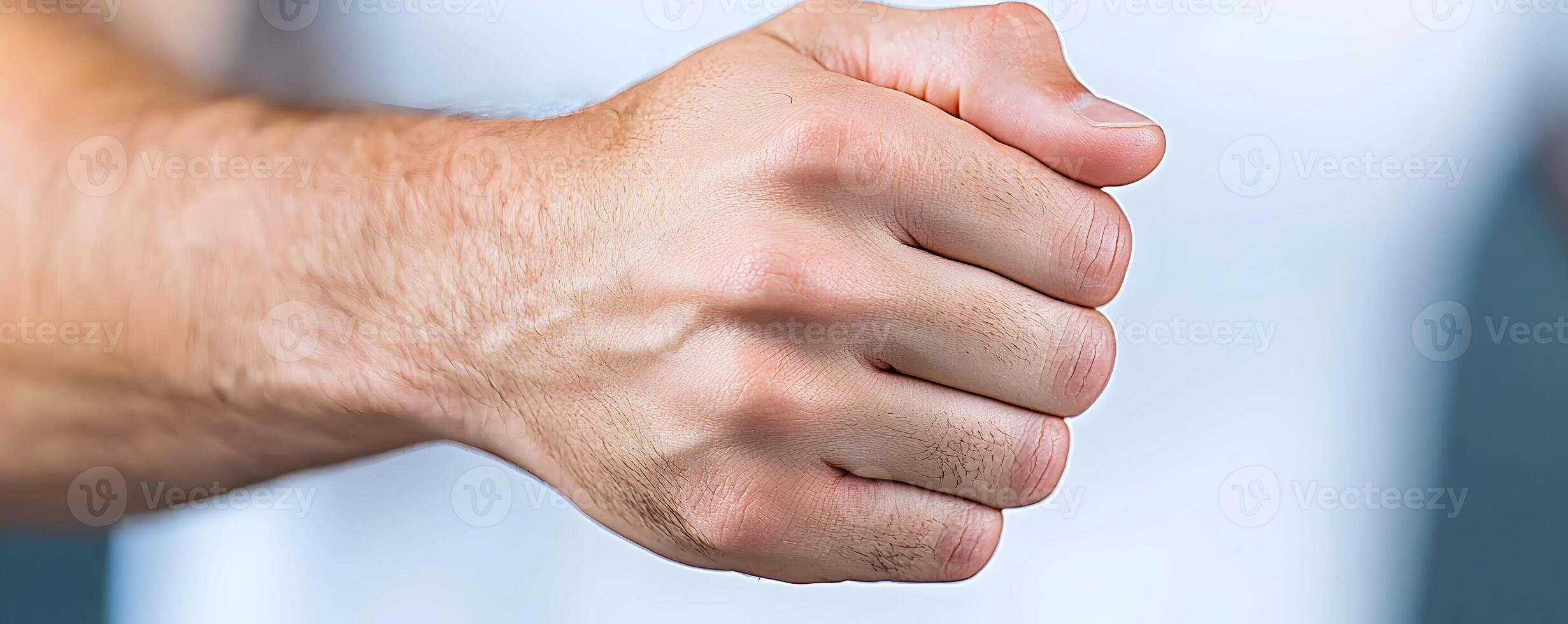Close-Up of a Person's Hand with a Visible Dimple photo