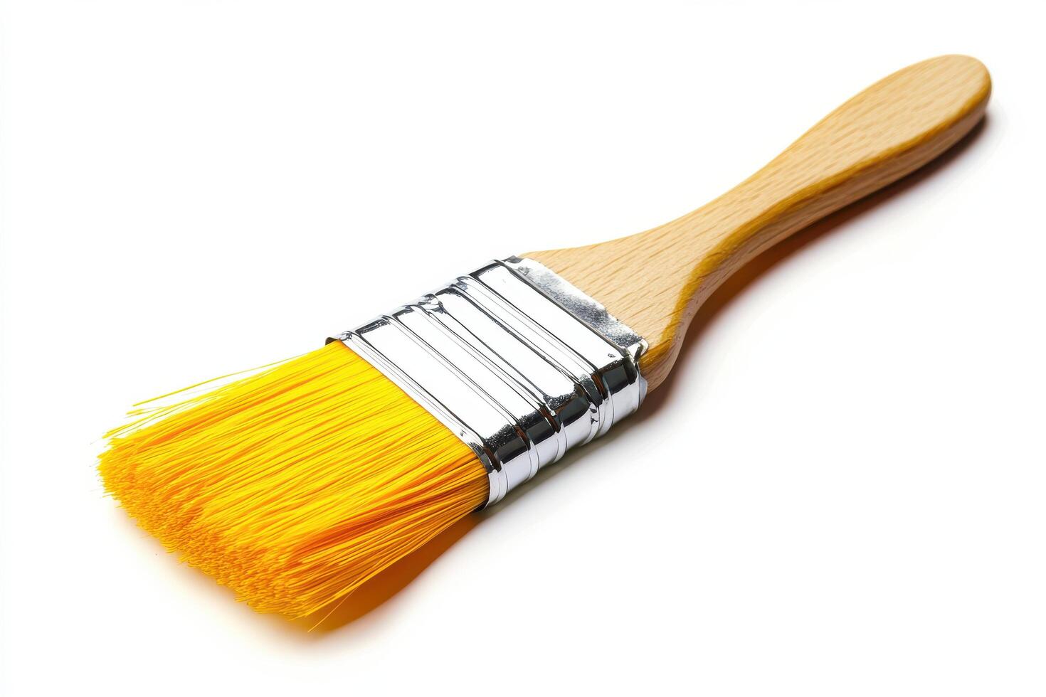 Paintbrush with Vibrant Yellow Bristles photo