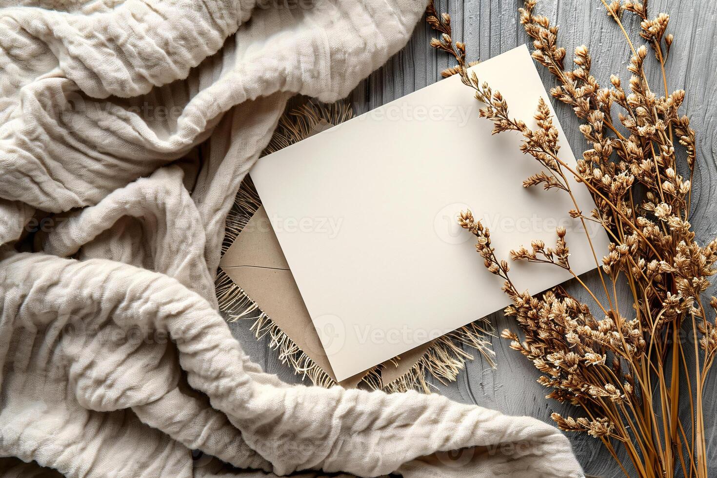 Blank card on a wooden table with dried flowers photo