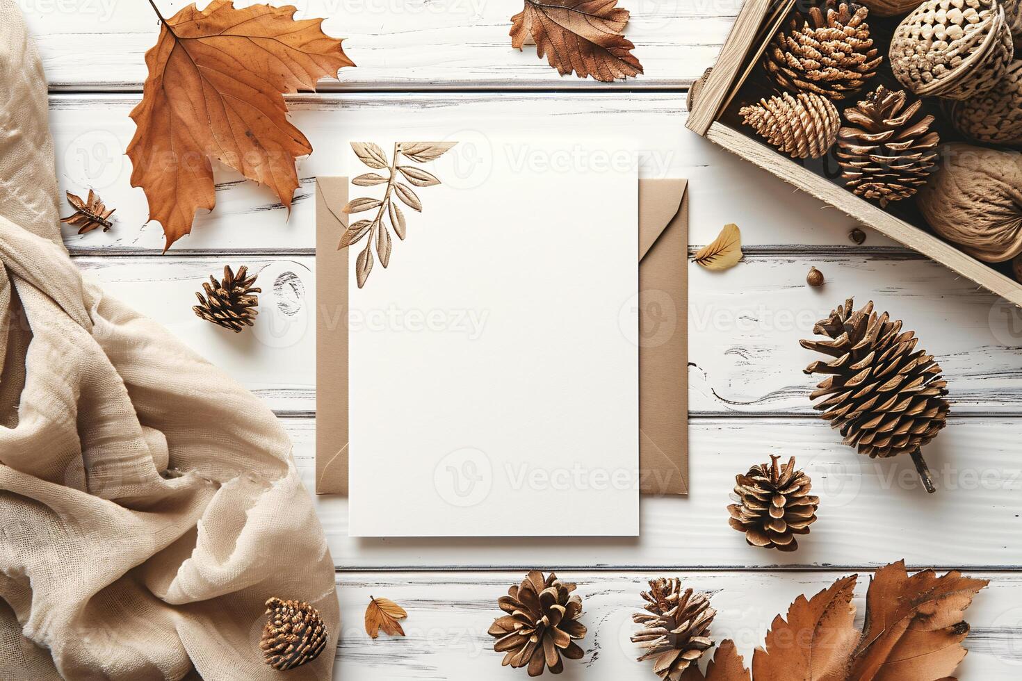 Autumn leaves and pine cones on a wooden table photo