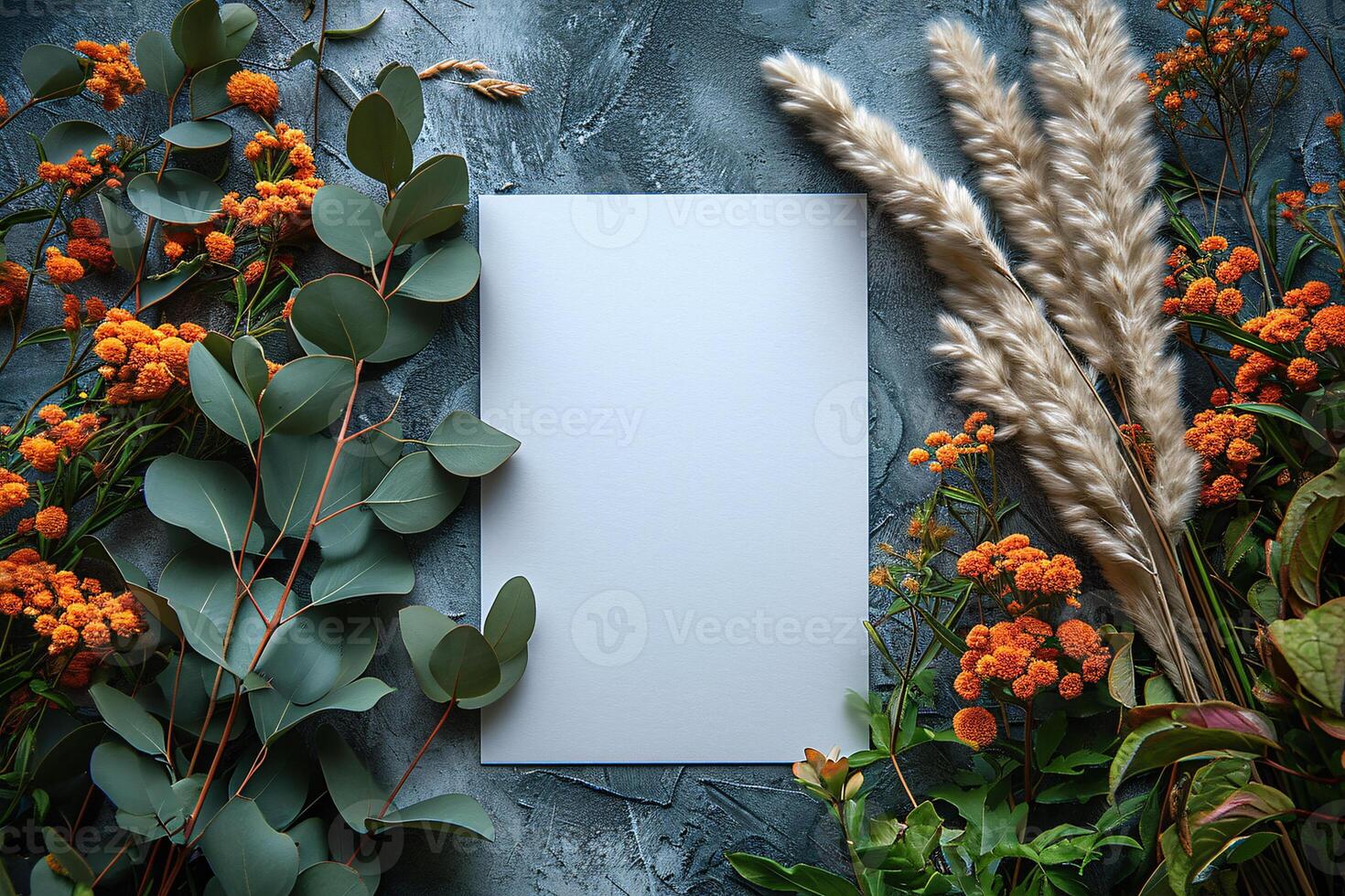 A blank card surrounded by flowers and plants photo