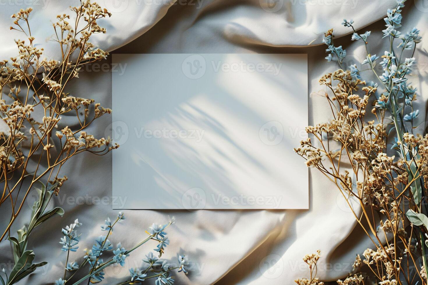 Blank white paper on a bed of flowers photo