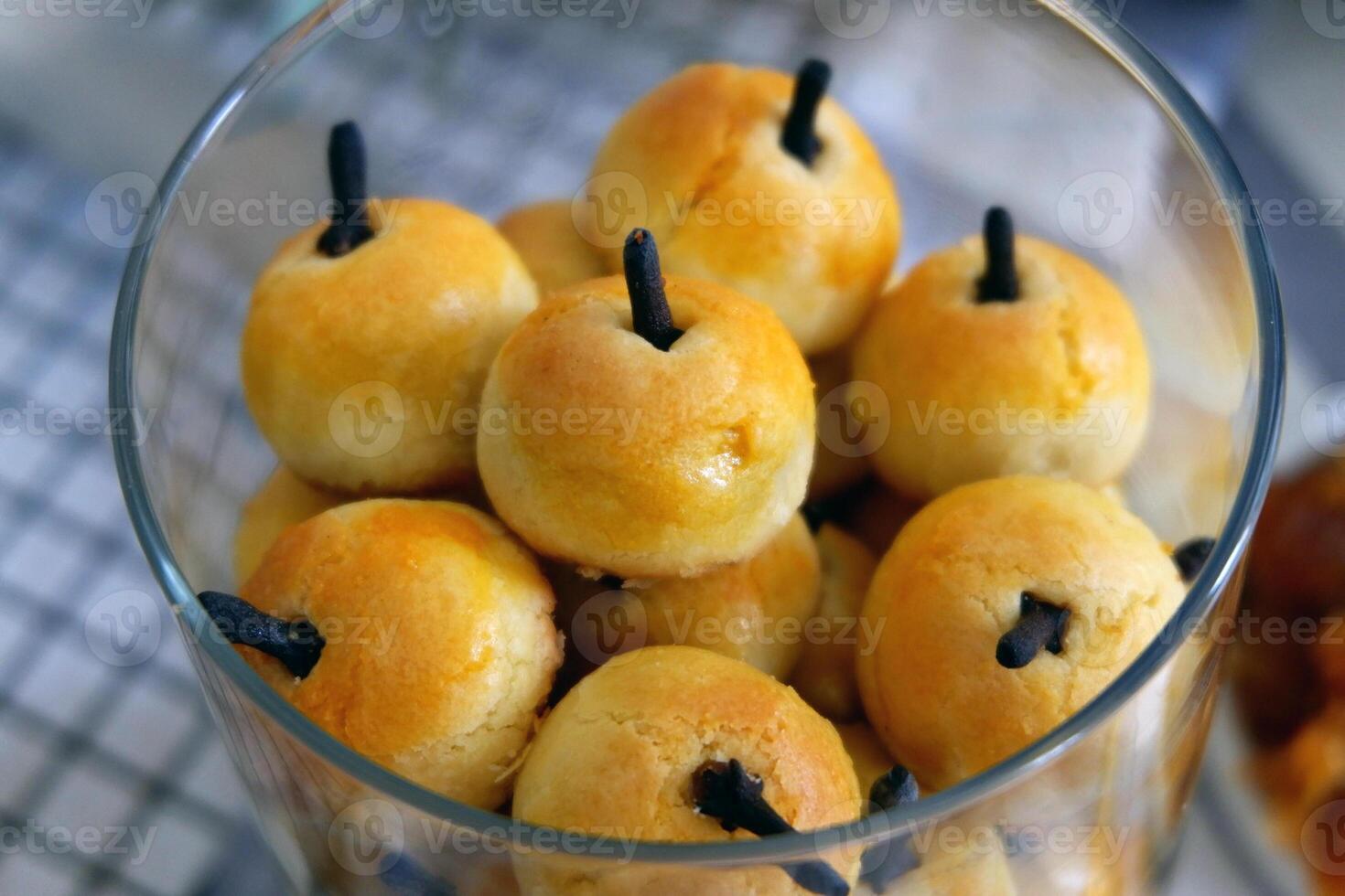 Nastar is Indonesian pastry, traditionally served during festive occasions like Eid al-Fitr, Christmas or Chinese New Year. It is a small, buttery, and crumbly cookie filled with a sweet pineapple jam photo