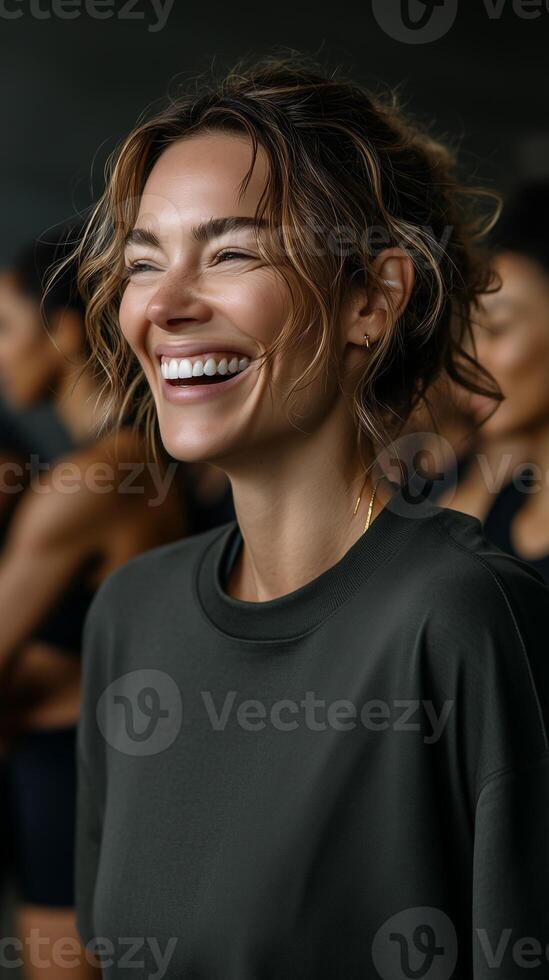 Wellness coach smiles while leading group weight loss program in a supportive atmosphere photo