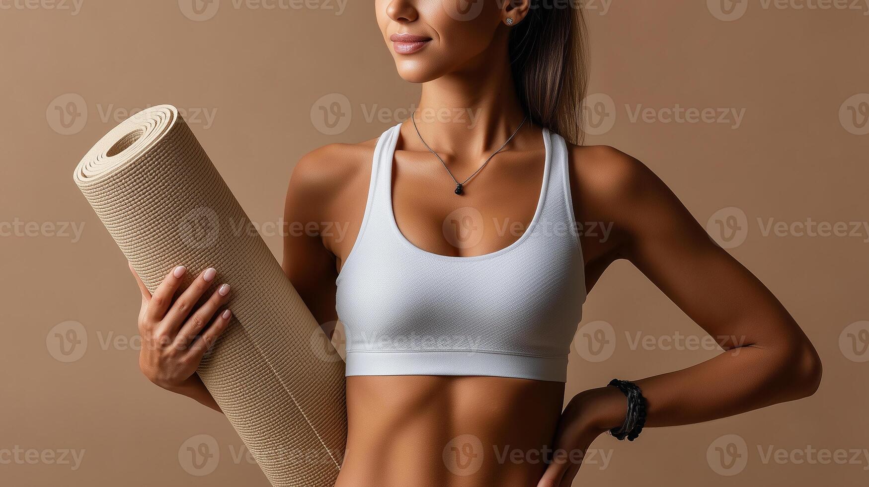 Woman holds yoga mat against soft beige background, ready for practice and mindfulness in serene environment photo