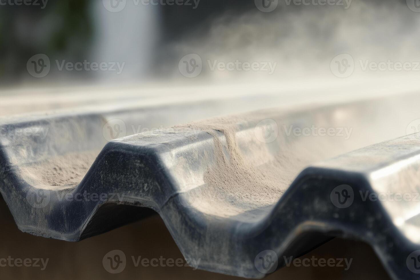 Quarry dust accumulation on corrugated roofing in an industrial setting during daylight hours photo
