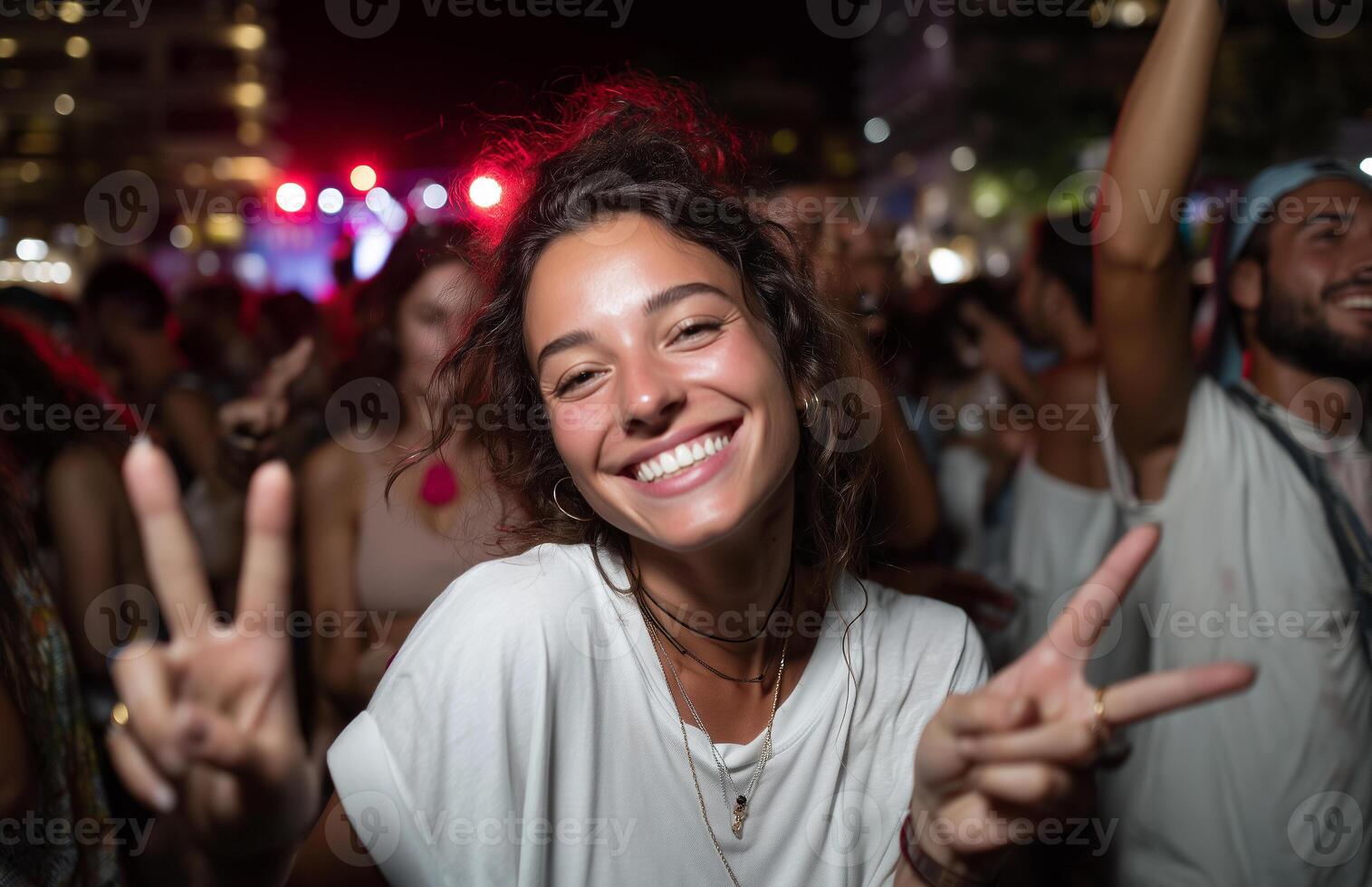 Happy woman celebrates summer night at a lively party filled with dancing friends and vibrant energy photo