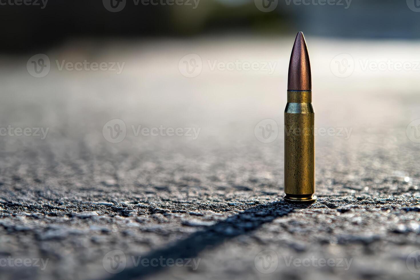 Bullet standing on a surface during daylight photo