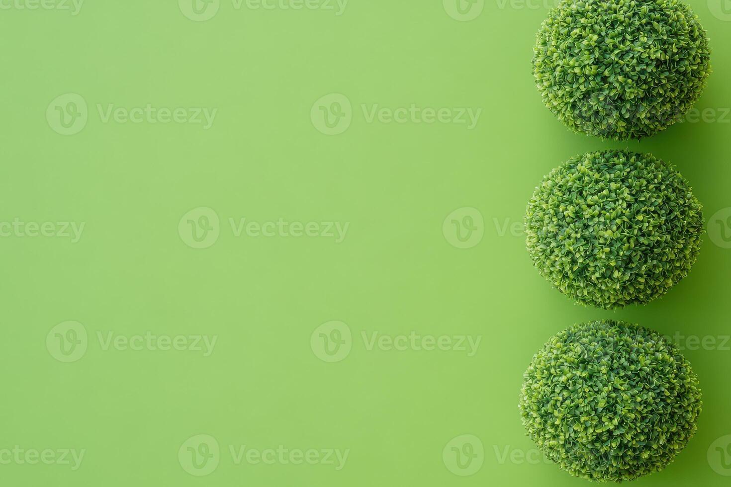 Decorative green spheres on a smooth surface photo
