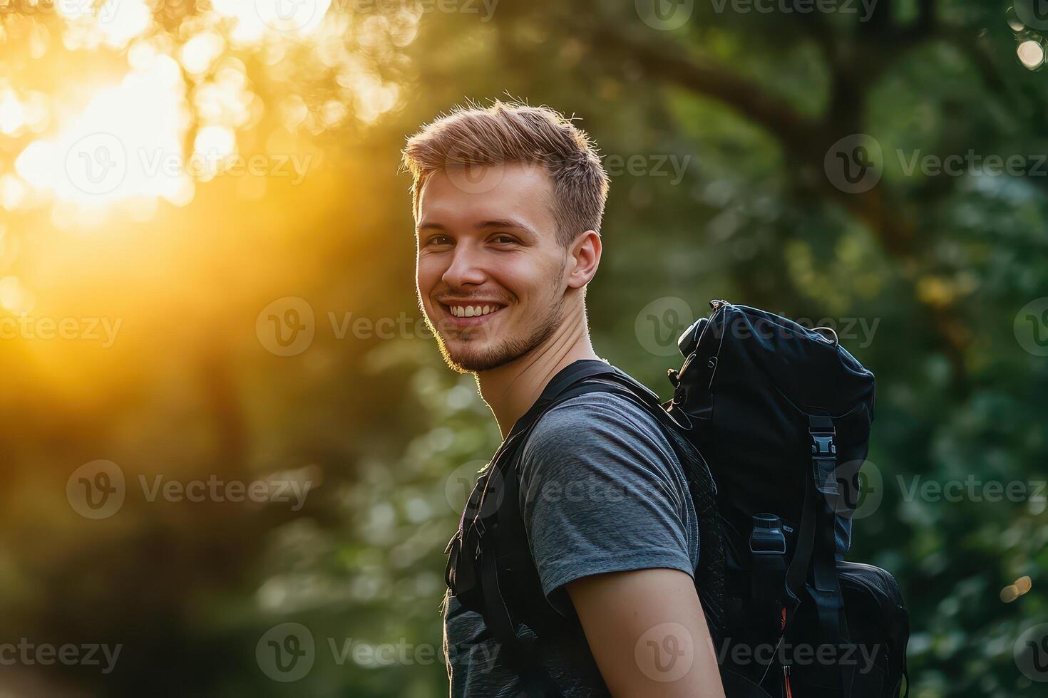 Hiker enjoys sunset in lush forest location photo