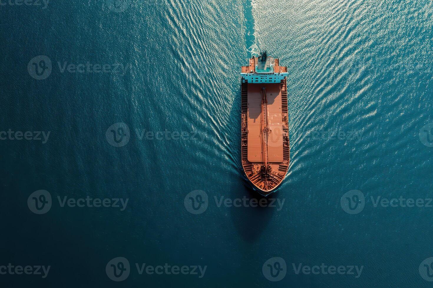 Cargo ship navigates calm blue waters photo