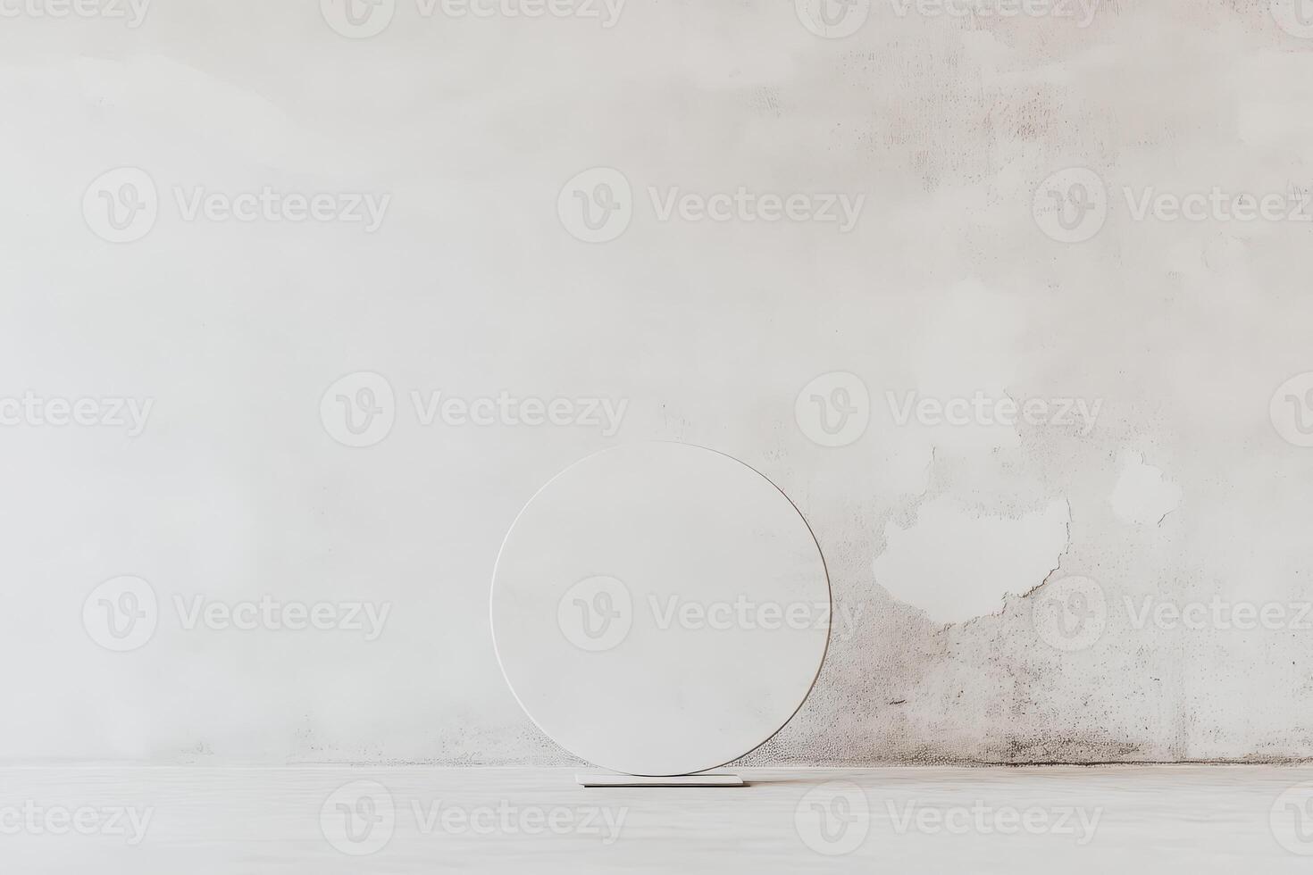 Minimalist circular mirror on a textured wall photo