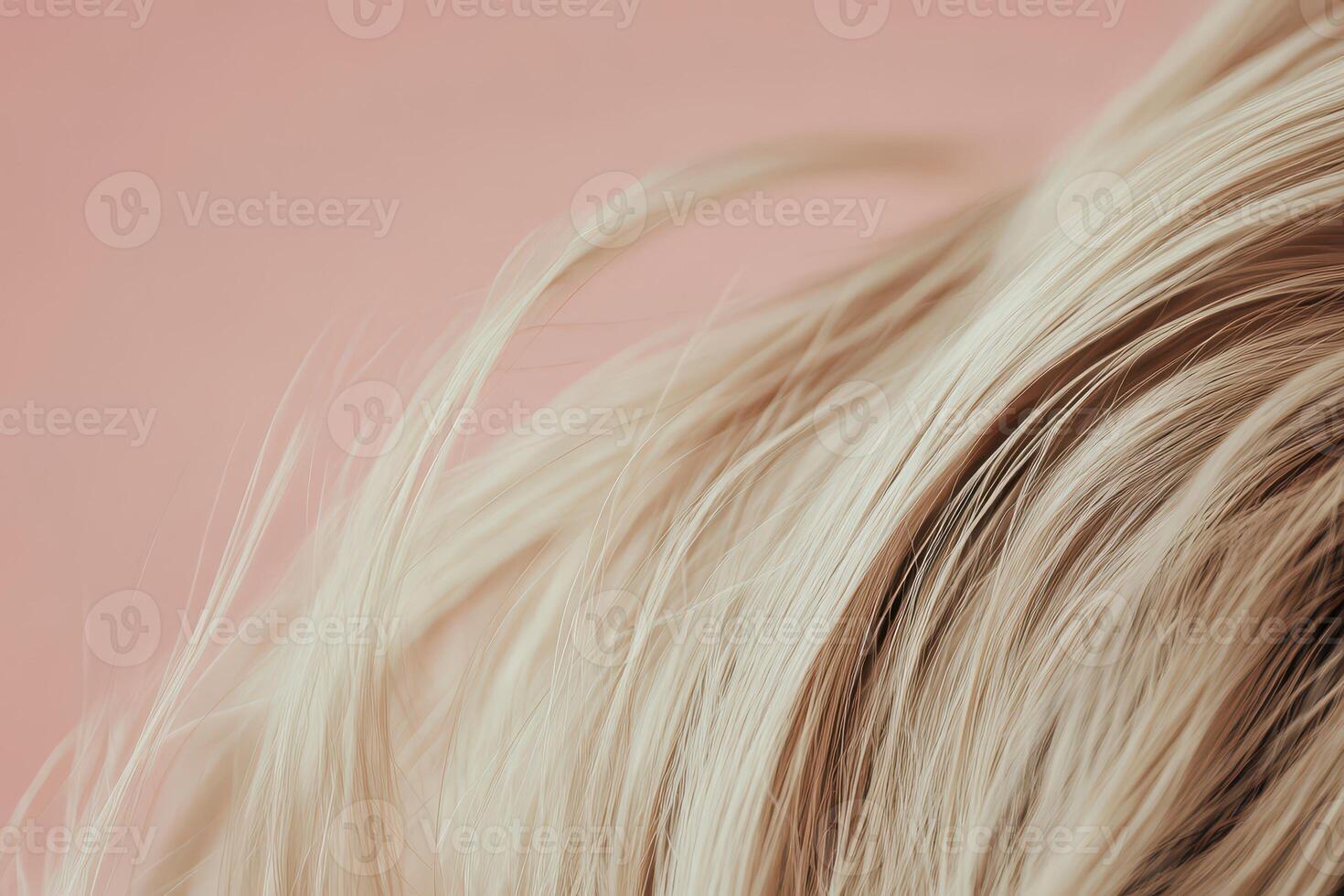 Soft flowing hair against a pale background photo