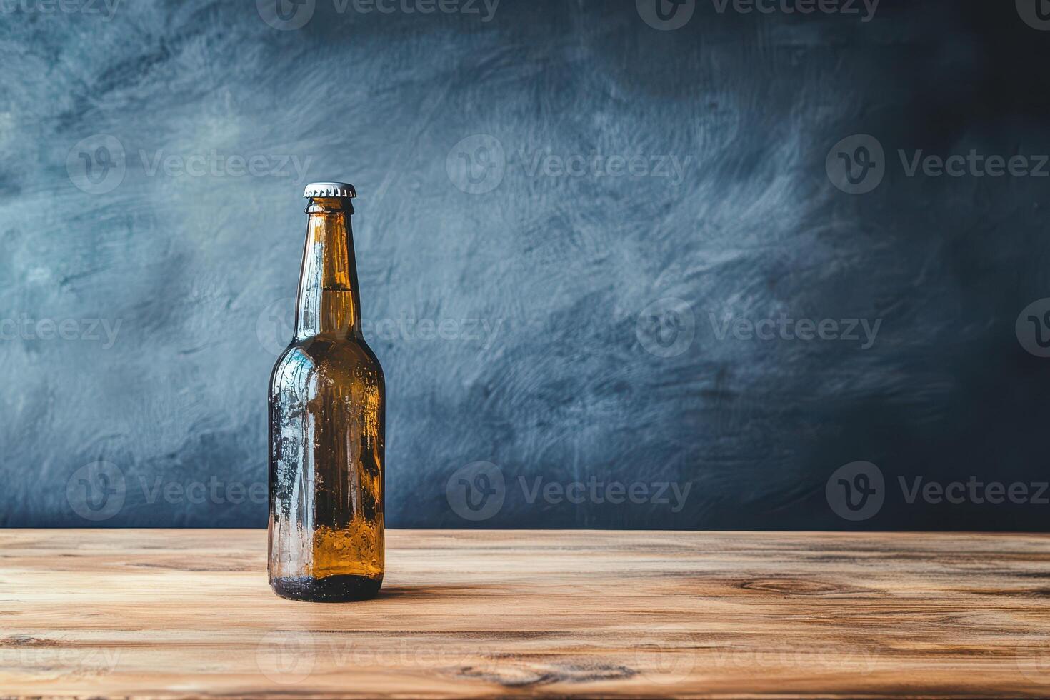 Beer bottle on wood table with texture photo