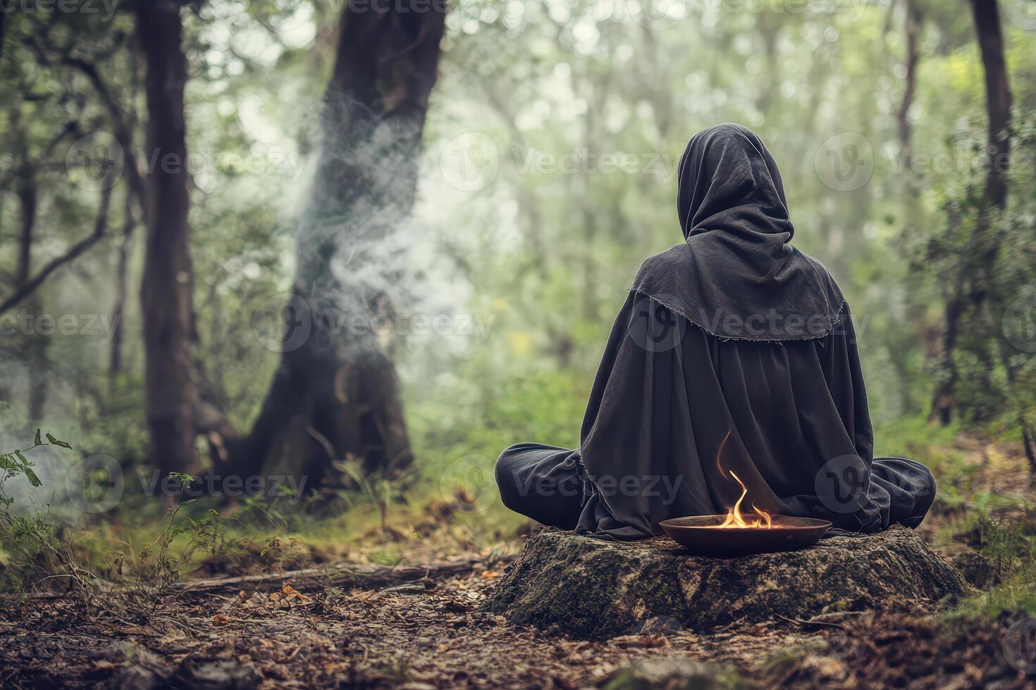 Meditating in a peaceful forest photo