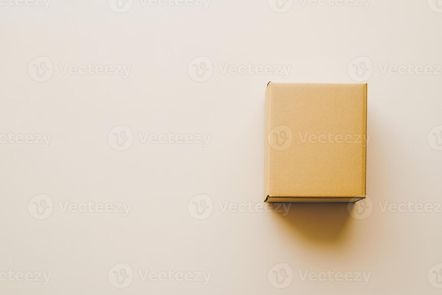 Simple brown package on a clean surface photo