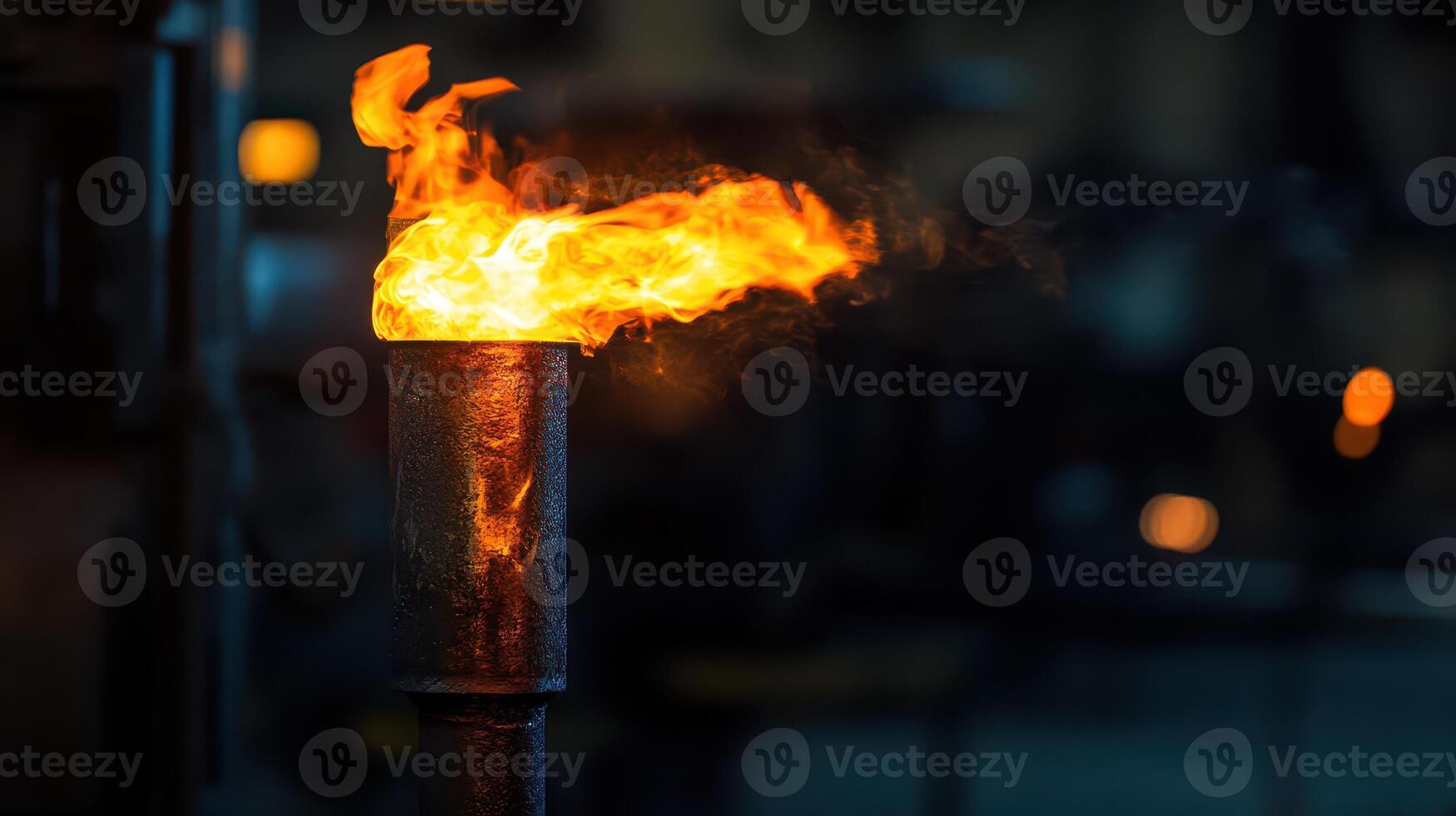 Flame bursts from workshop torch photo