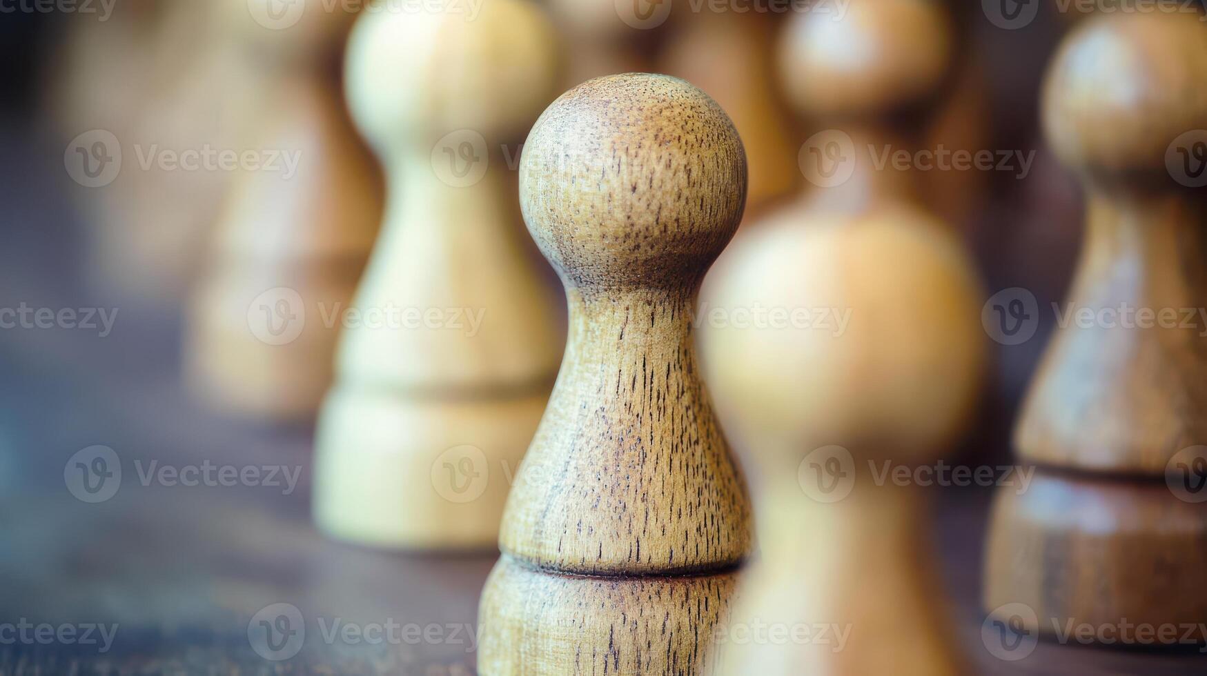 Wooden game pieces arranged on a table in focus photo