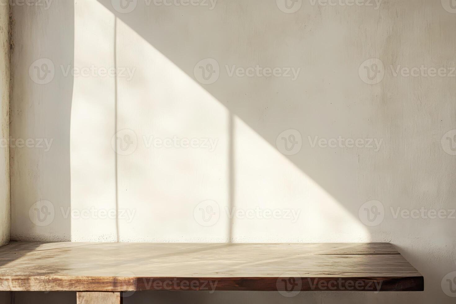 Wooden table and soft sunlight shadows photo