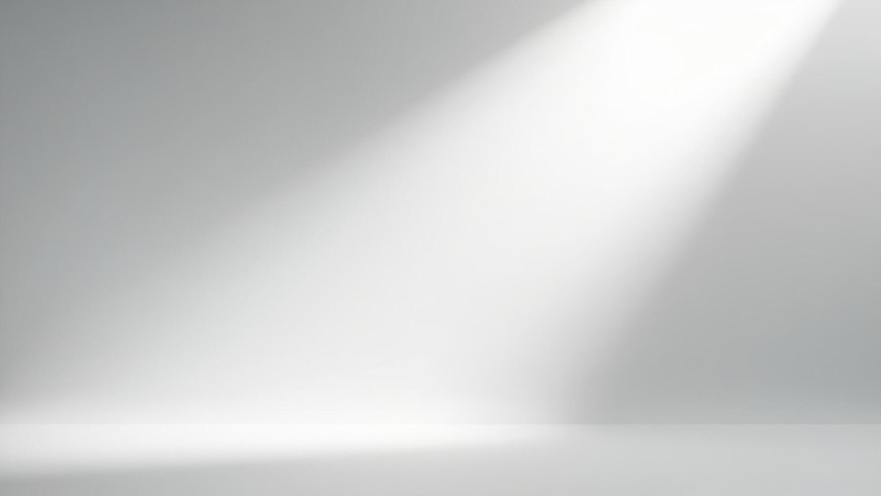 Minimalist studio room with bright spotlight and soft lighting on a clean gray background for presentation. photo