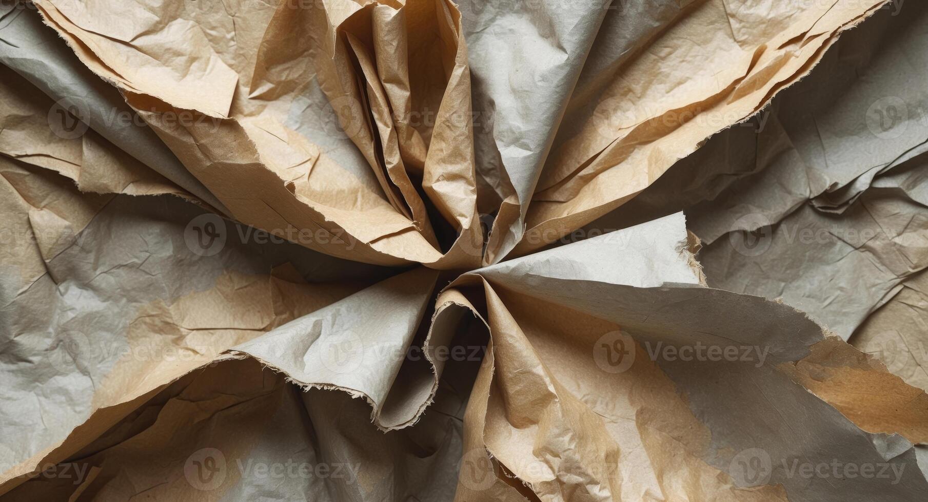 Crumpled paper background with a flower shape photo