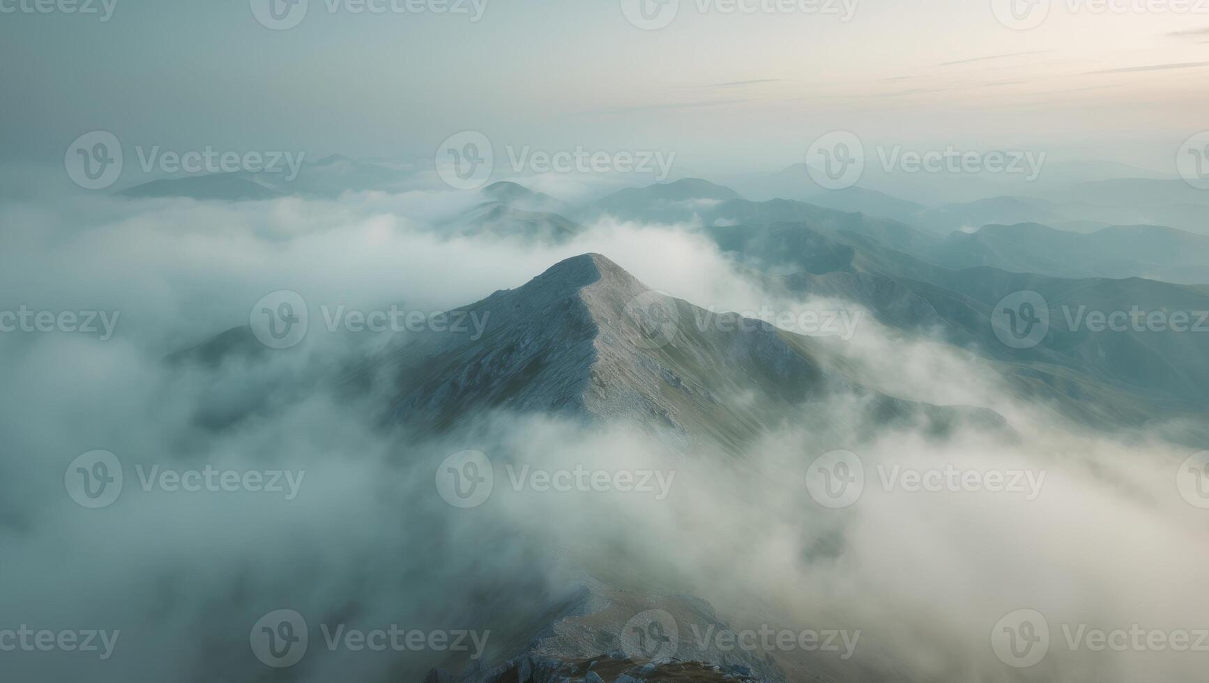 Misty Mountain Peak View A Serene Landscape of Hills and Clouds, Early Morning photo