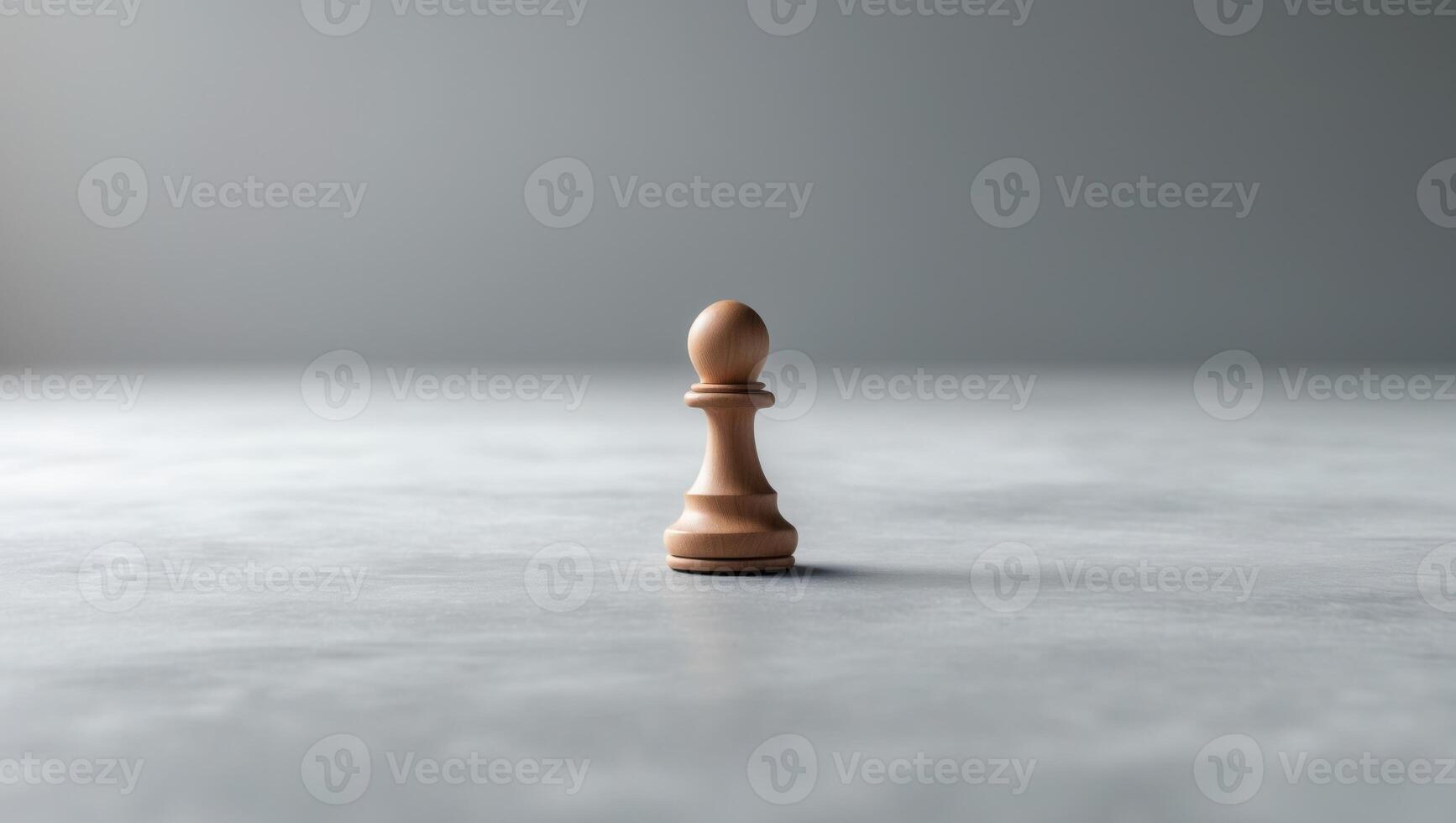 A small wooden chess piece on a table photo