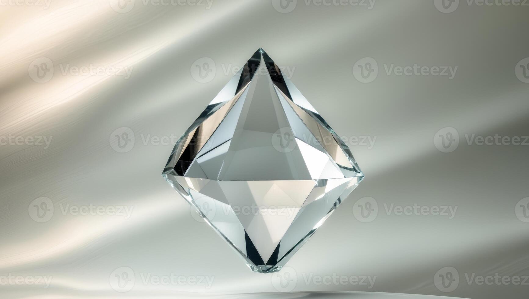 A diamond shaped object on a white background photo