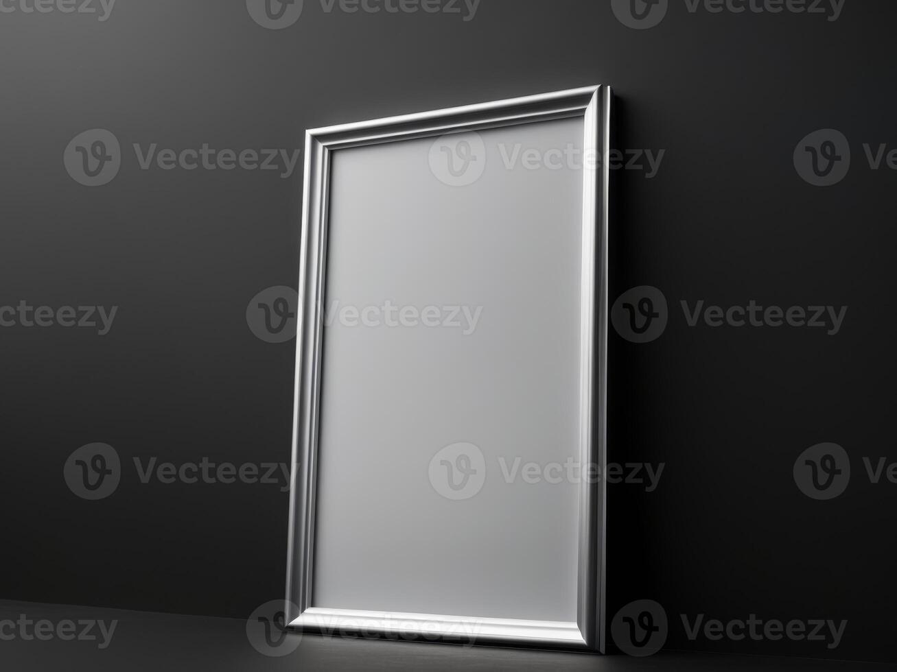 A blank white frame on a black wall photo