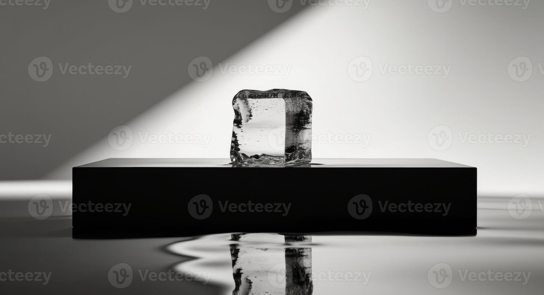 A Single Ice Cube Melting on a Black Podium, Dramatic Lighting and Reflections. photo