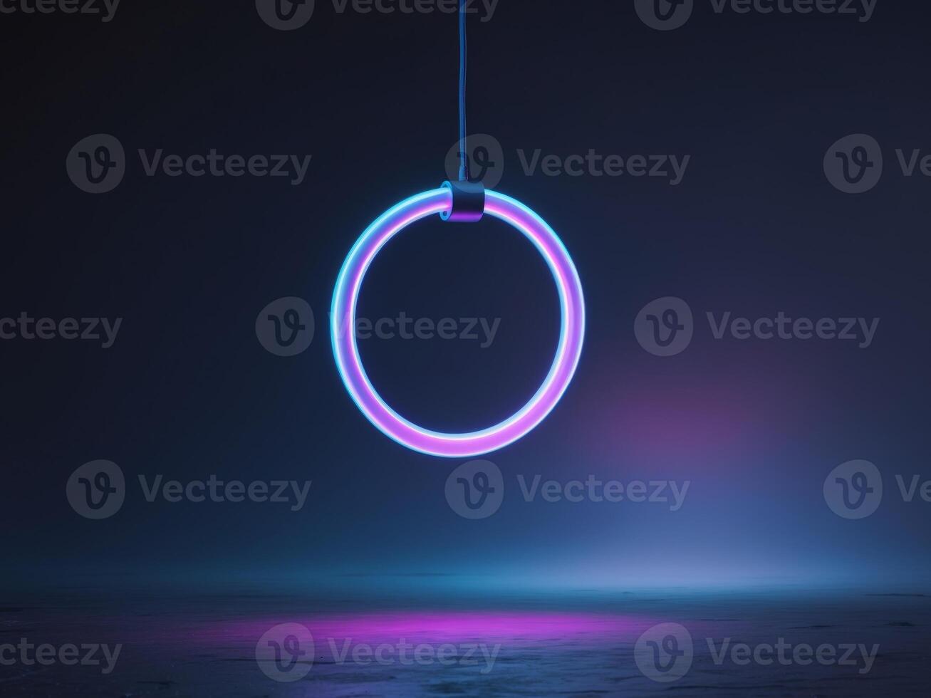 A neon light ring hanging from a ceiling photo