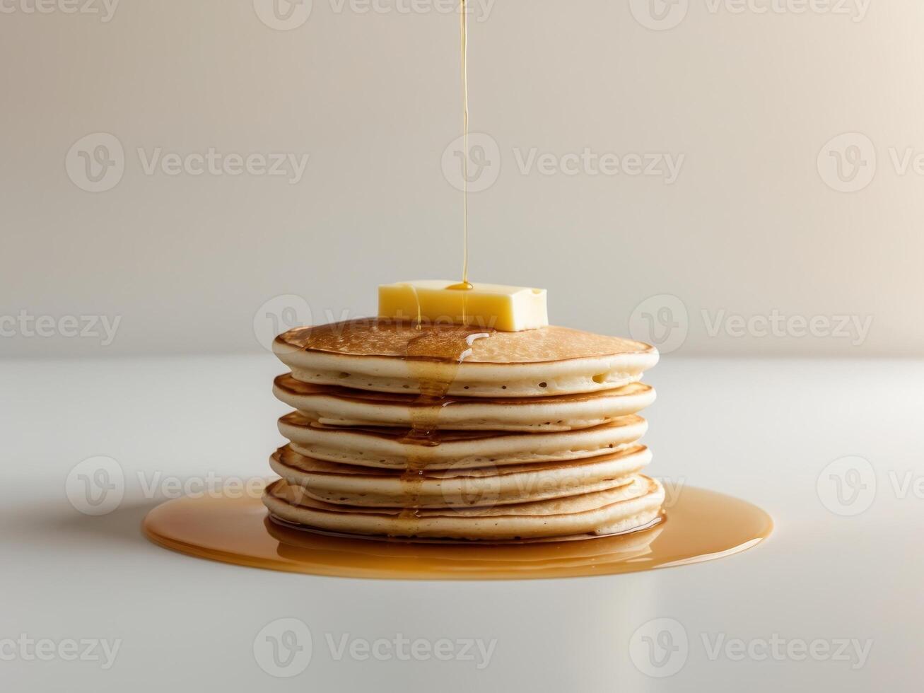 Stack of Pancakes with Butter and Syrup. A Delicious and Tempting Breakfast Treat. photo