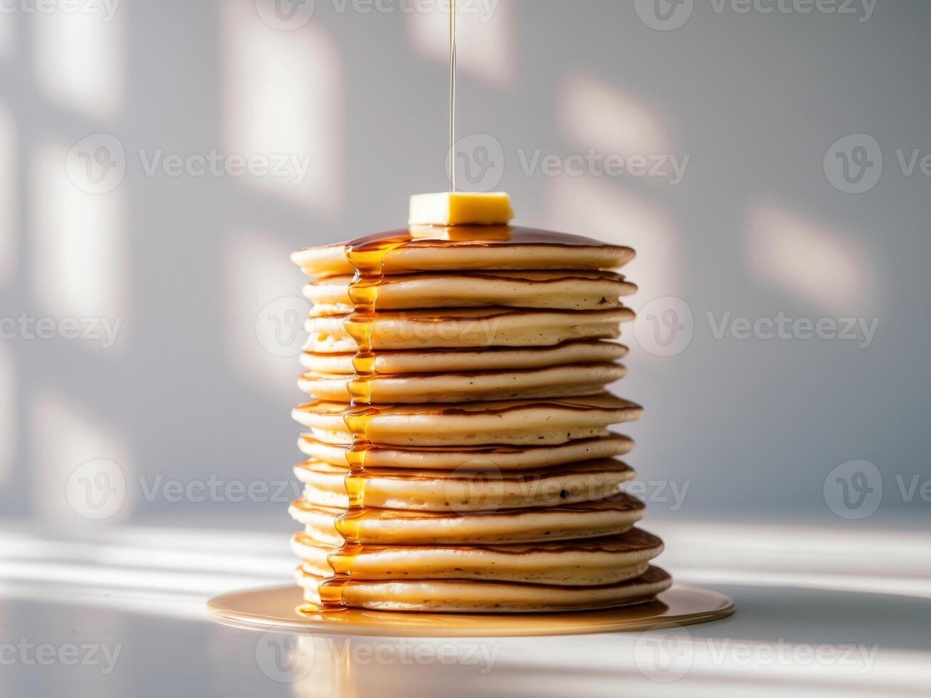 Stack of Delicious Pancakes with Butter and Maple Syrup, Breakfast Treat. photo