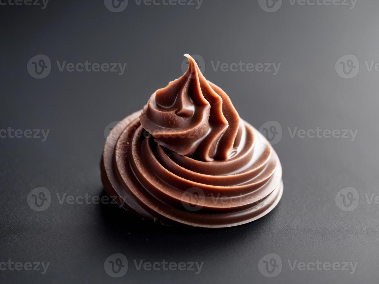 Delicious Chocolate Swirl on Dark Background, Confectionery Delight Closeup. photo