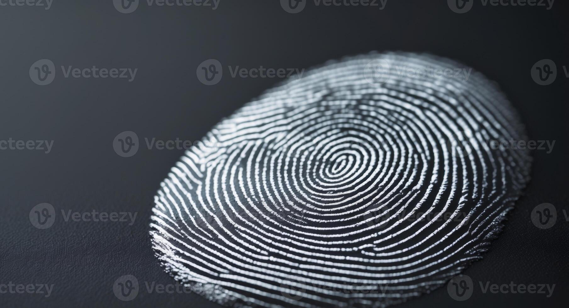 Fingerprint closeup on a dark surface, representing identification and individuality. photo