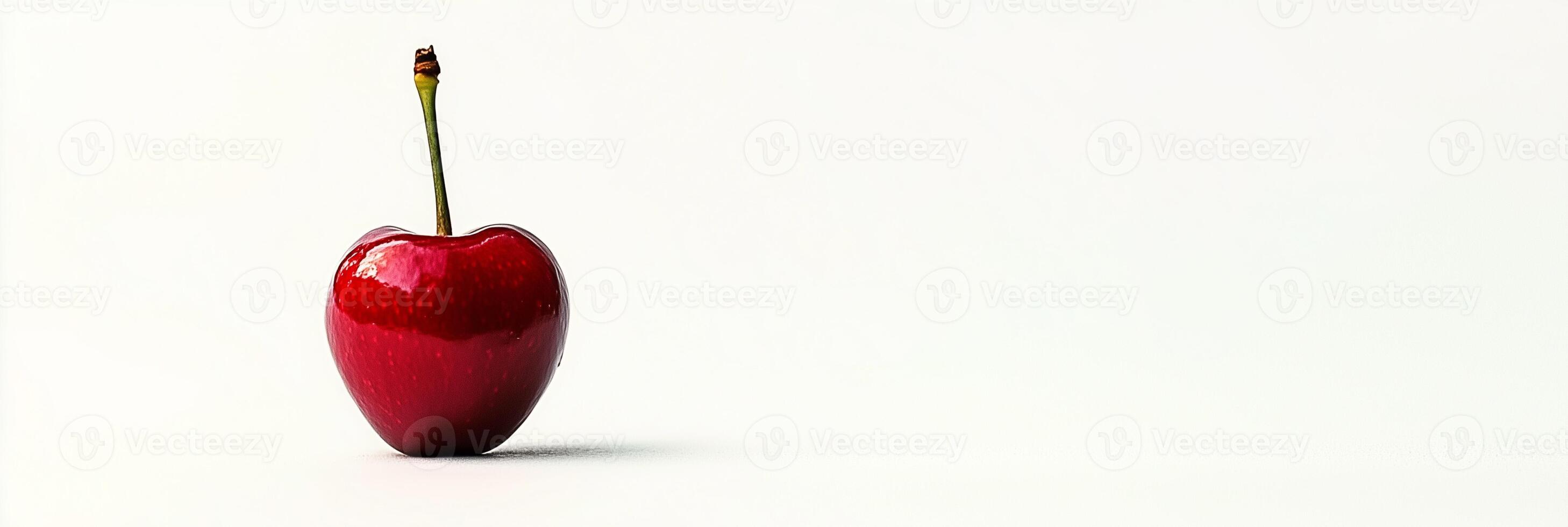 A red apple with a stem sticking out of it photo