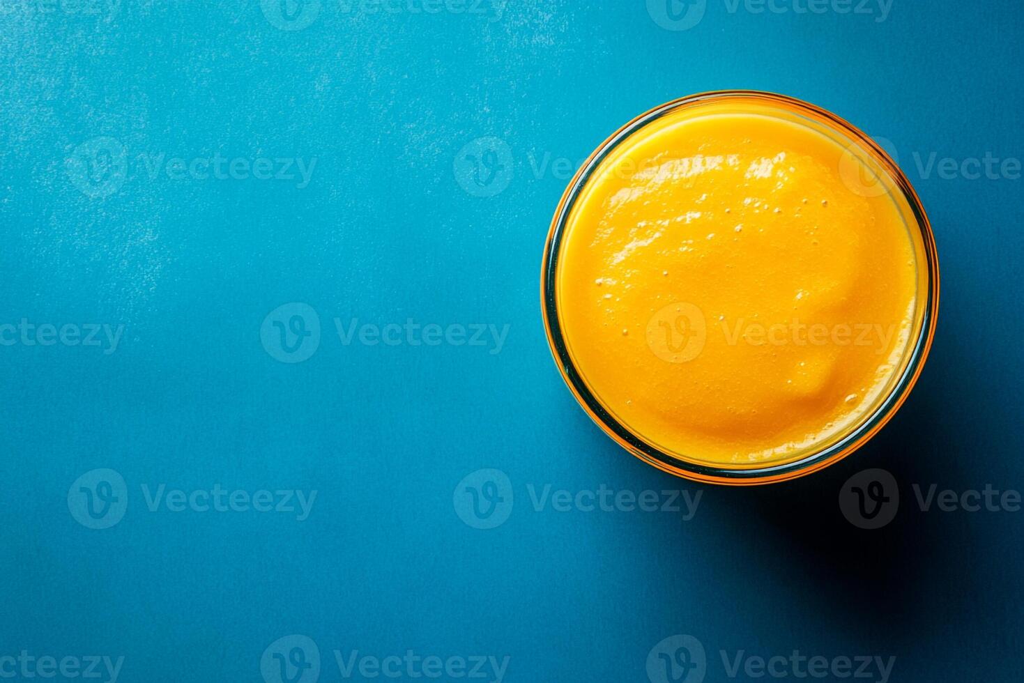 Top View Of Mango Smoothie On Vibrant Background With Copy Space, Cuisine Photography photo