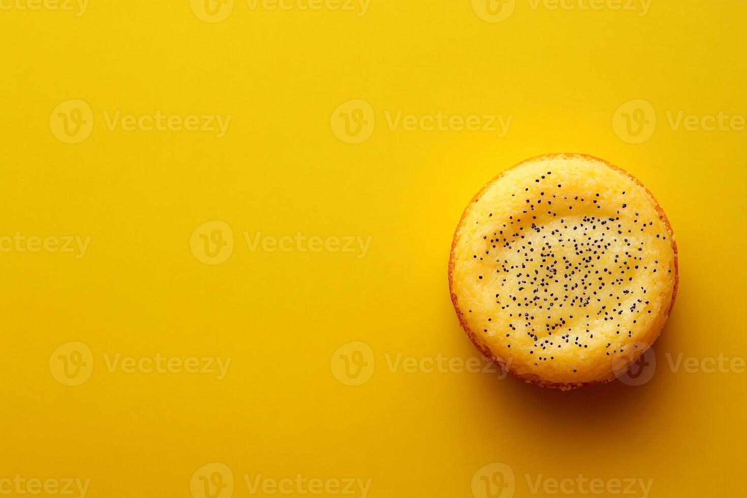 Top View Of Small Lemon Poppyseed Cake On Vibrant Background With Copy Space, Cuisine Photography photo