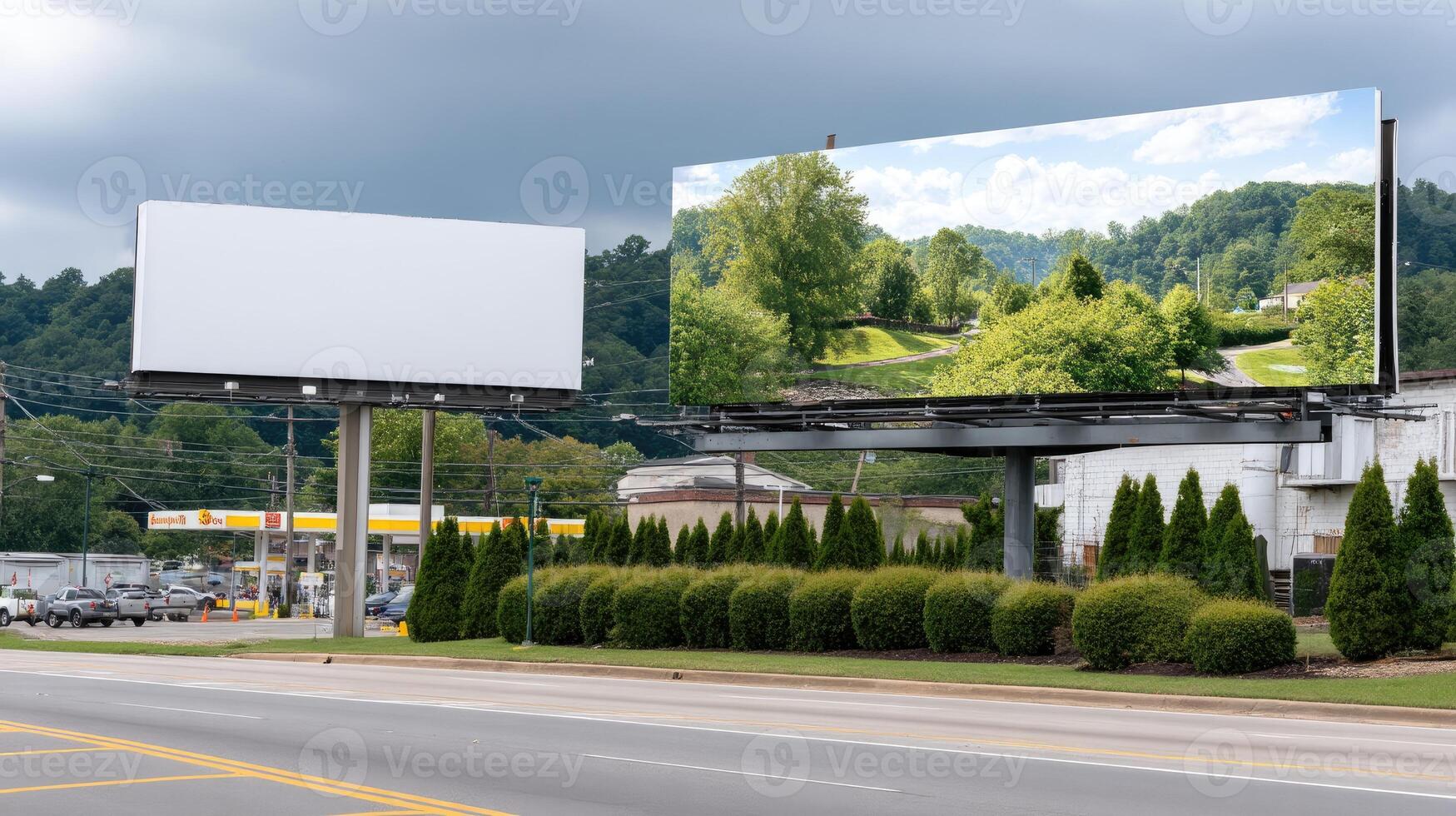 A billboard on the side of a road with a green field photo