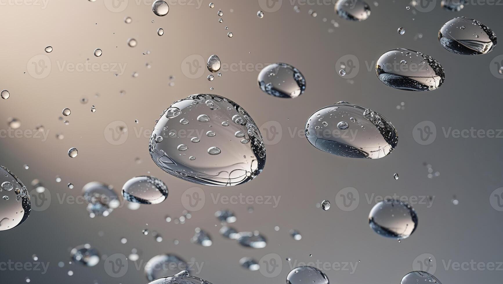 Transparent droplets glistening on reflective surface with soft light photo
