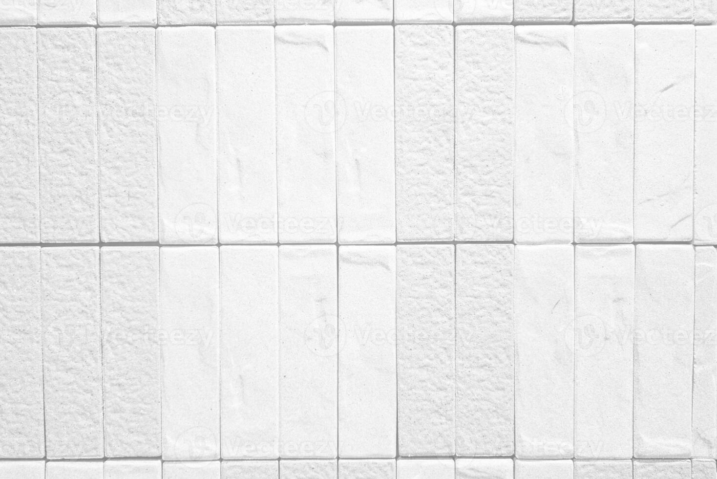 Close up of White Tile pattern Texture Wall for Background. photo
