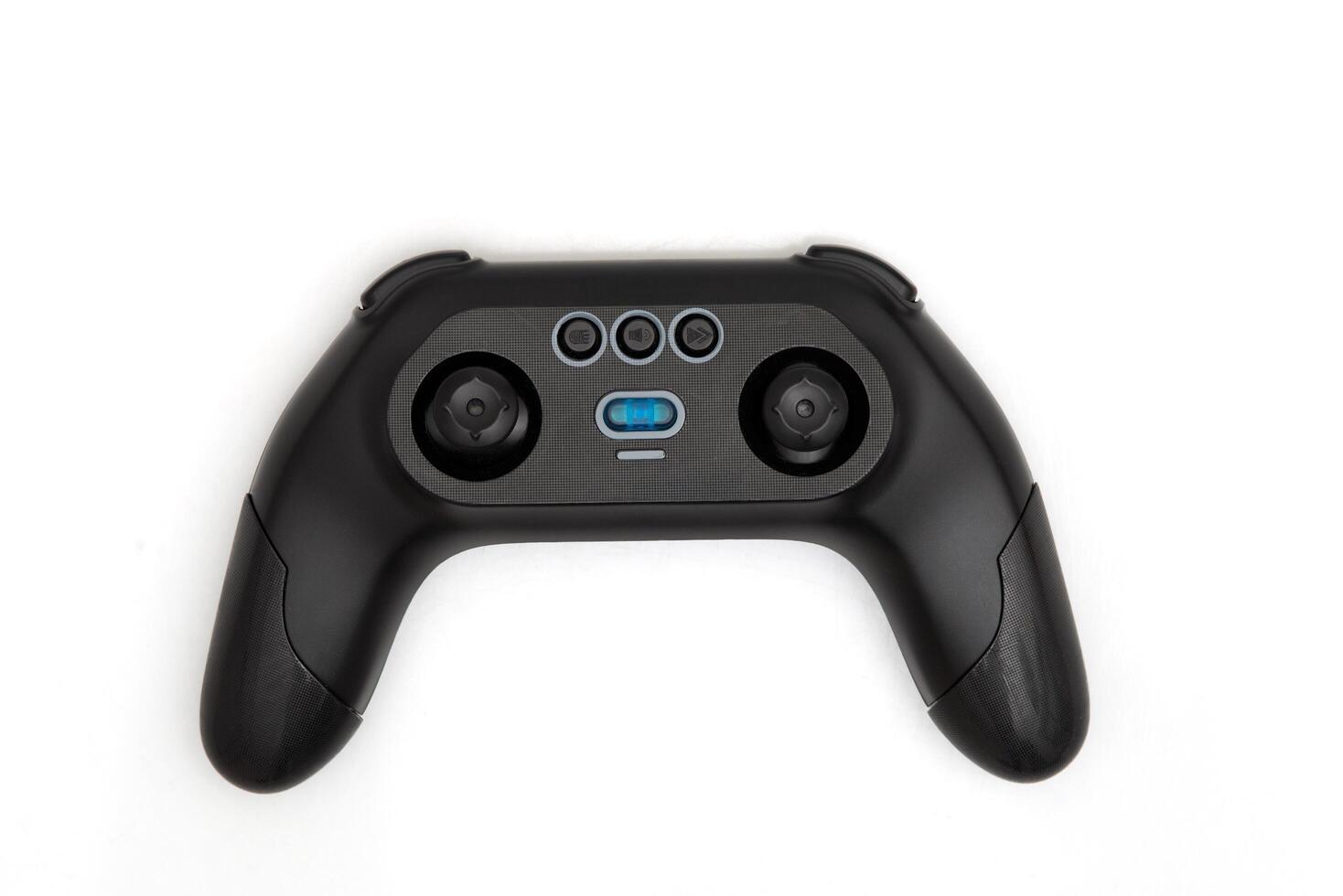Modern black game controller with joysticks and buttons on white background, view of a sleek wireless gaming accessory photo