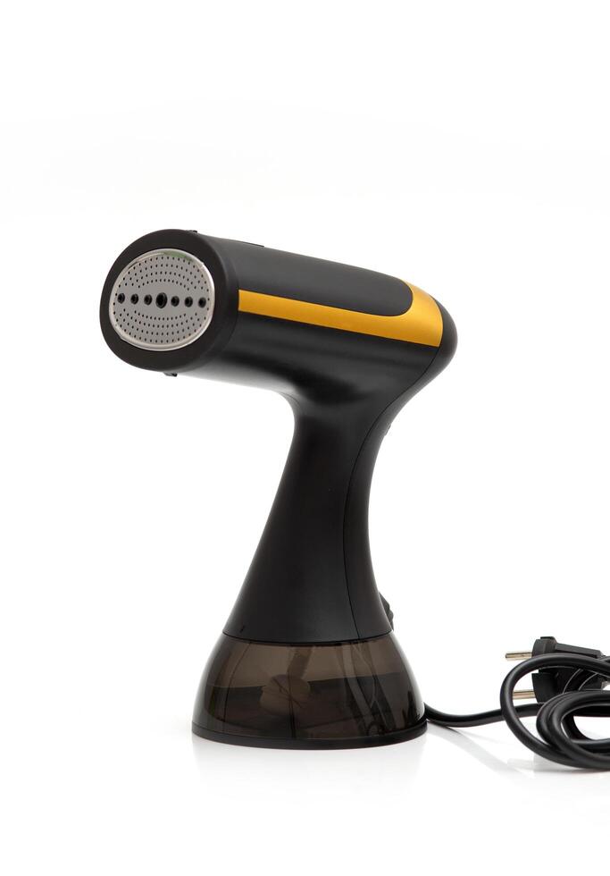 Modern handheld garment steamer on white background, compact and portable, ideal for travel and home fabric care. photo