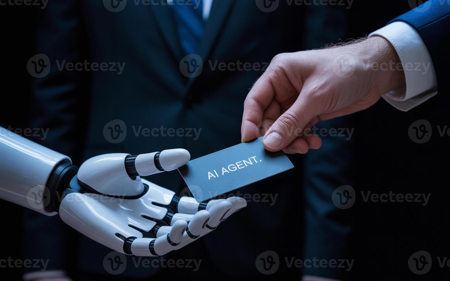 A robot hand holding a business card with the word ai photo