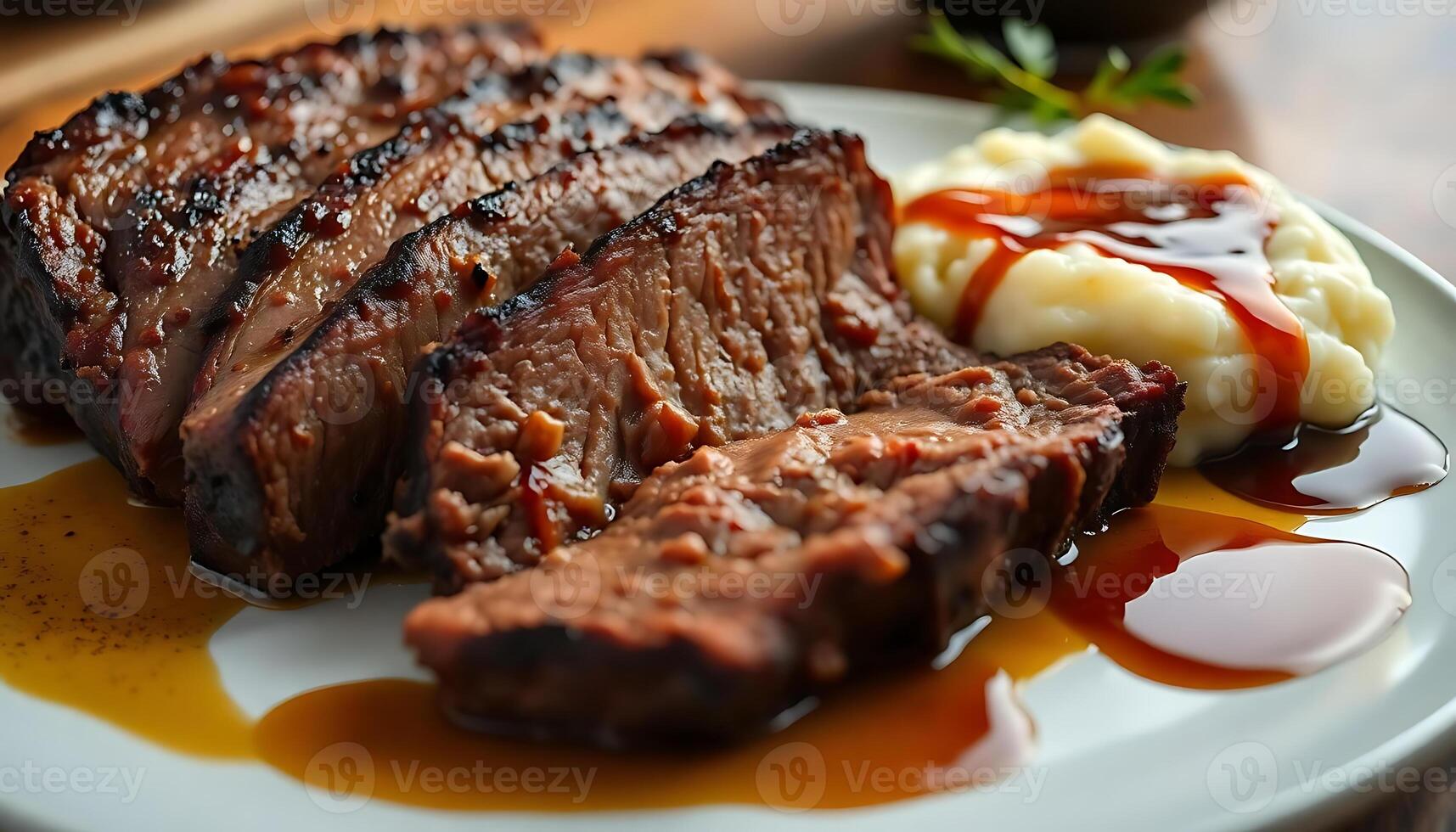 white plate topped with meat and mashed potatoes photo