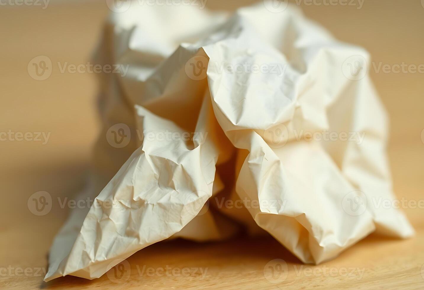 close up of a paper ball on a table photo