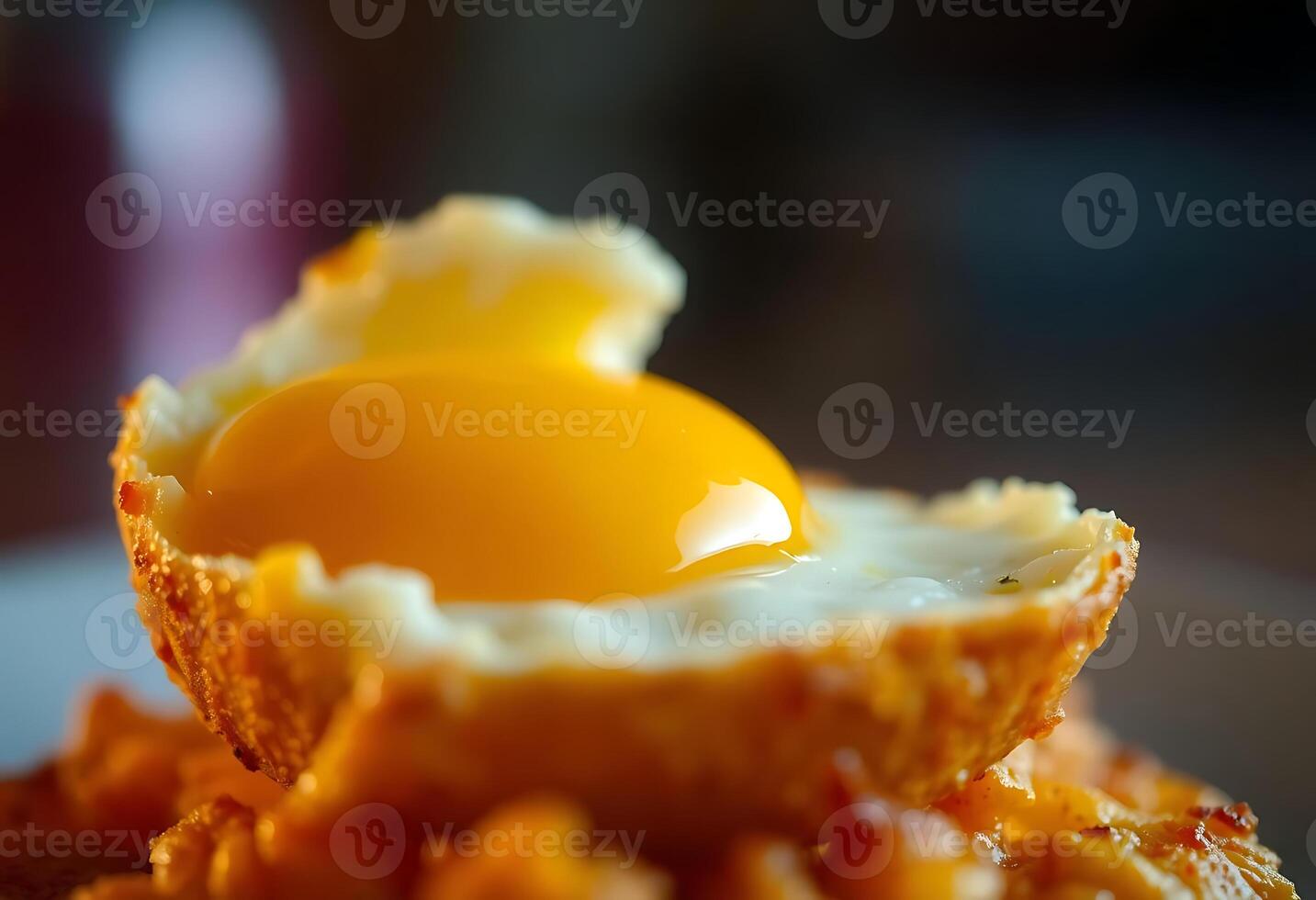 close up of a fried egg on a plate photo