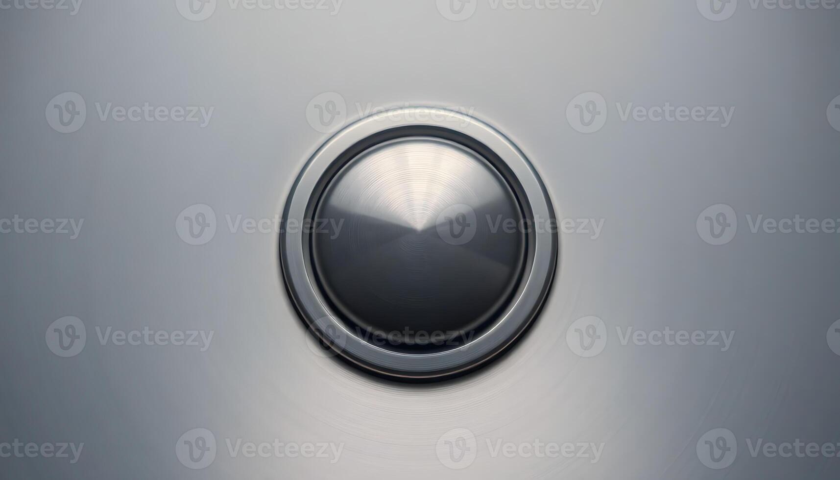 close up of a button on a metal surface photo