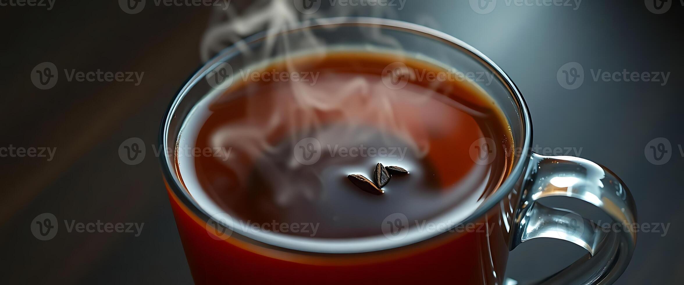 close up of a cup of coffee with steam coming out of it photo